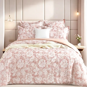 Aura Blush Jacquard Quilt Cover Set by Renee Taylor