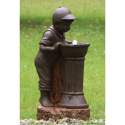 Boy at Water Fountain